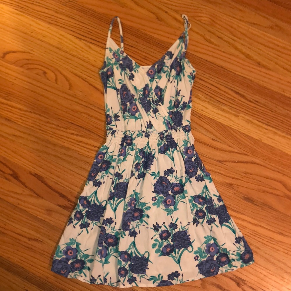 White short sundress with blue flower detail